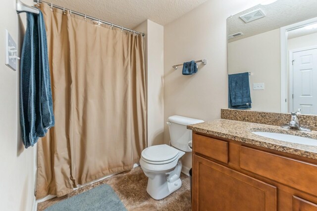 1870 SE Oxford Dr, Waukee, IA 50263 - bathroom featuring a textured ceiling, vanity, and curtained shower