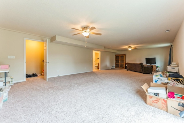 1870 SE Oxford Dr, Waukee, IA 50263 - unfurnished living room featuring a ceiling fan, carpet, and a baseboard radiator