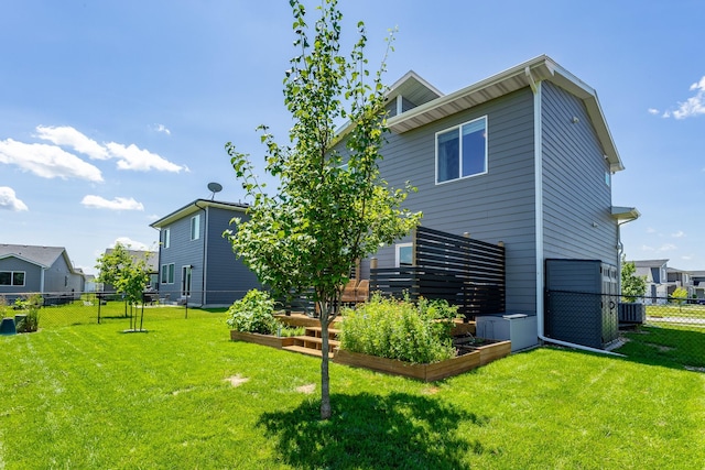 1375 SE Parkview Crossing Dr, Waukee, IA 50263 - back of house featuring a garden