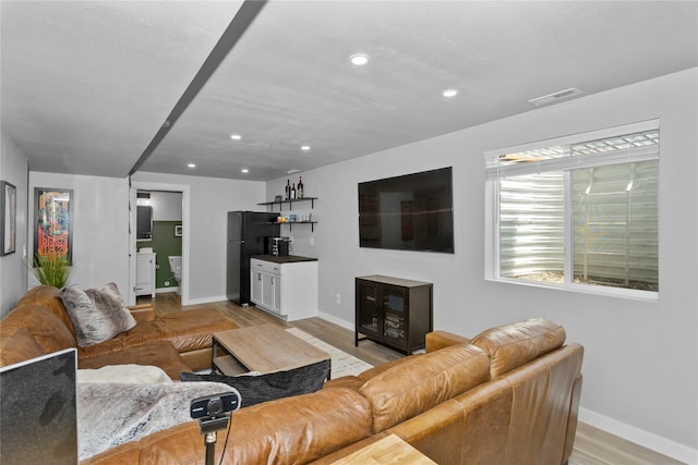 1375 SE Parkview Crossing Dr, Waukee, IA 50263 - living area featuring recessed lighting and light wood-style flooring