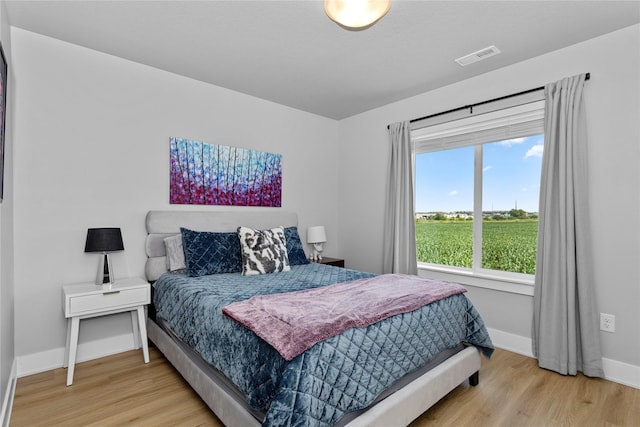 1375 SE Parkview Crossing Dr, Waukee, IA 50263 - bedroom with wood finished floors