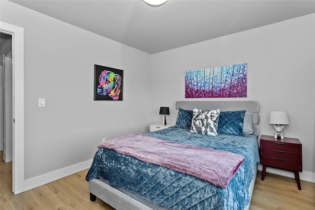 1375 SE Parkview Crossing Dr, Waukee, IA 50263 - bedroom with wood finished floors and baseboards
