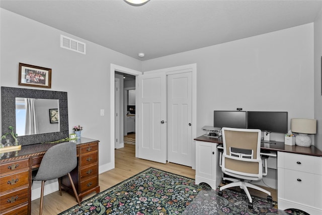1375 SE Parkview Crossing Dr, Waukee, IA 50263 - home office featuring light wood-style floors and baseboards