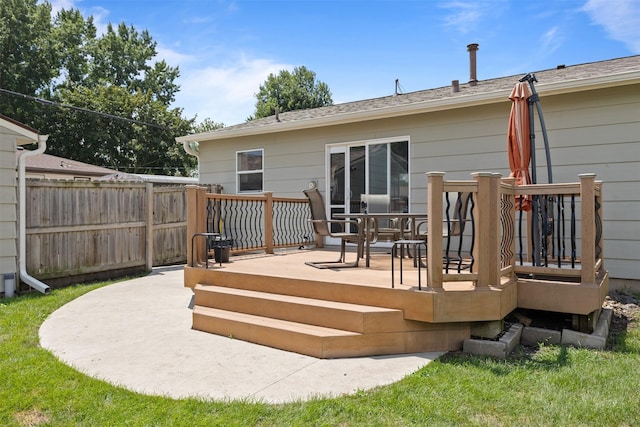 6675 NW 5th St, Des Moines, IA 50313 - rear view of property with a deck and outdoor dining space