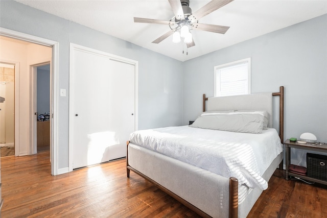 3504 56th St, Des Moines, IA 50310 - bedroom with wood finished floors, a closet, and ceiling fan