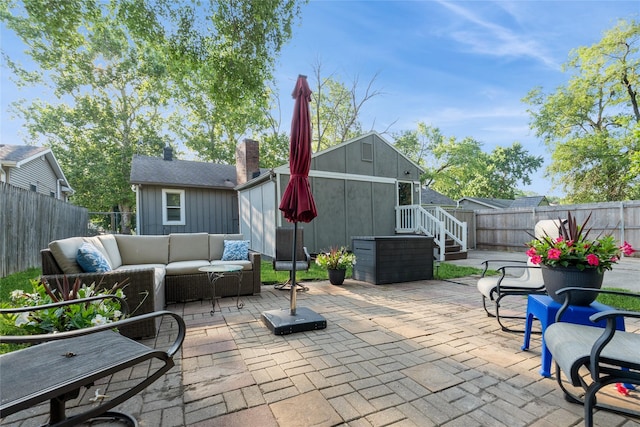 3504 56th St, Des Moines, IA 50310 - fenced backyard featuring an outdoor hangout area and a patio