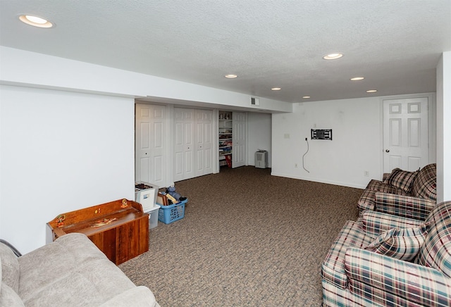 2726 Lakeland Dr, Urbandale, IA 50322 - living area with carpet flooring, recessed lighting, and a textured ceiling
