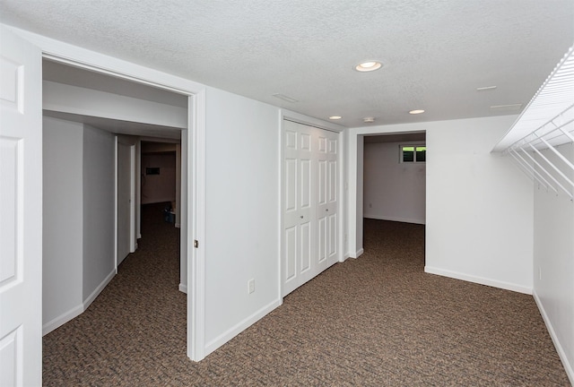 2726 Lakeland Dr, Urbandale, IA 50322 - corridor featuring carpet floors, a textured ceiling, and recessed lighting