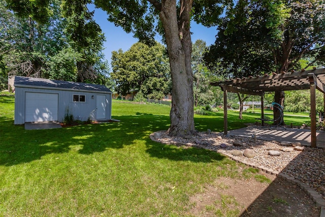 2726 Lakeland Dr, Urbandale, IA 50322 - view of green lawn with a pergola, an outdoor structure, and a patio area