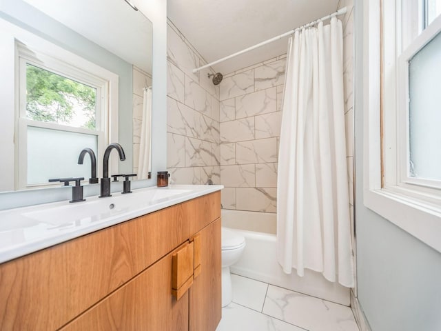 3934 Lincoln Place Dr, Des Moines, IA 50312 - bathroom featuring marble look tile flooring, vanity, and shower / bath combo
