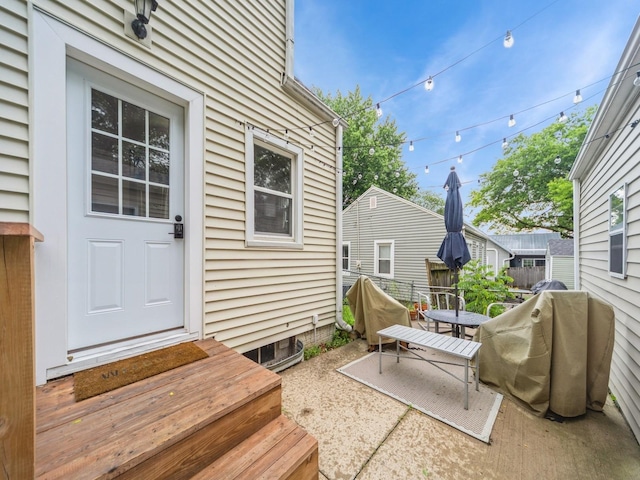 3934 Lincoln Place Dr, Des Moines, IA 50312 - wooden terrace with grilling area