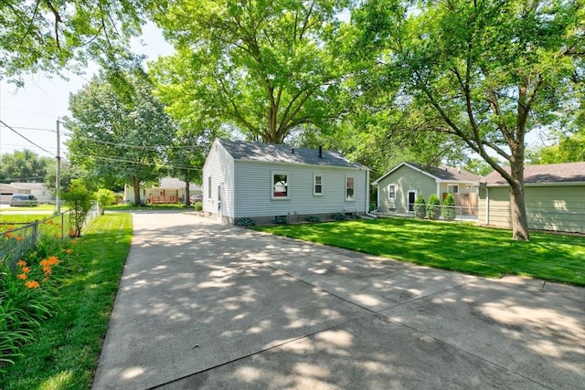 5613 College Ave, Des Moines, IA 50310 - bungalow-style house featuring concrete driveway