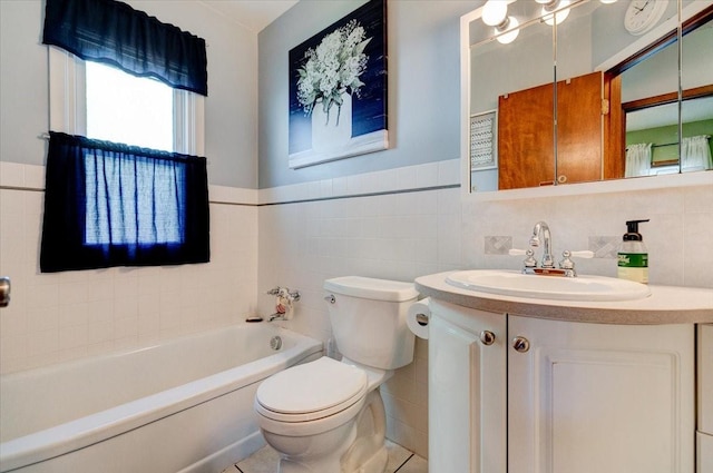 5613 College Ave, Des Moines, IA 50310 - bathroom featuring tile walls, a garden tub, vanity, and a wainscoted wall