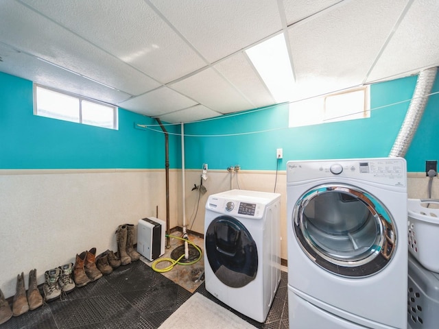 3303 Ashwood Dr, Urbandale, IA 50322 - washroom featuring washing machine and dryer