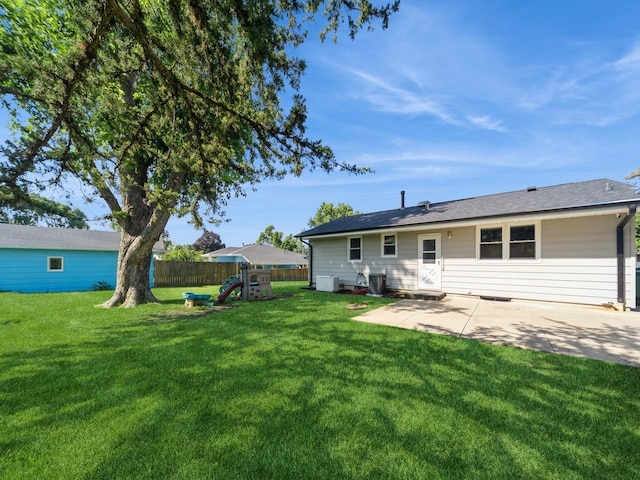 3303 Ashwood Dr, Urbandale, IA 50322 - back of property featuring a patio area and a playground