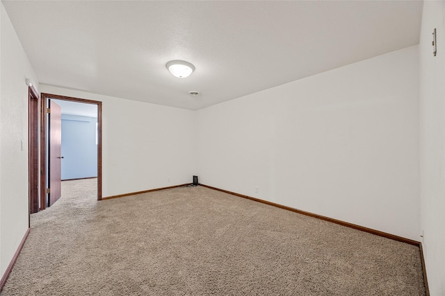 7005 Surrey Dr NE, Cedar Rapids, IA 52402 - carpeted spare room featuring baseboards