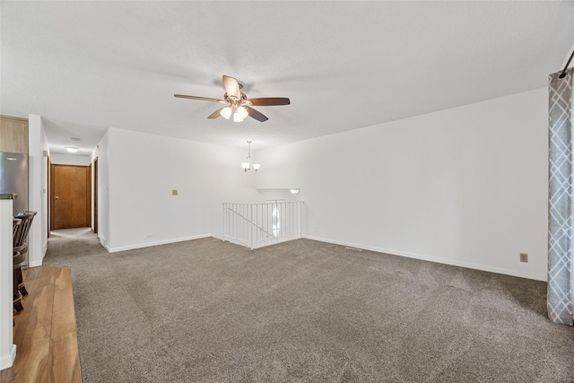 7005 Surrey Dr NE, Cedar Rapids, IA 52402 - unfurnished living room with a ceiling fan and carpet flooring