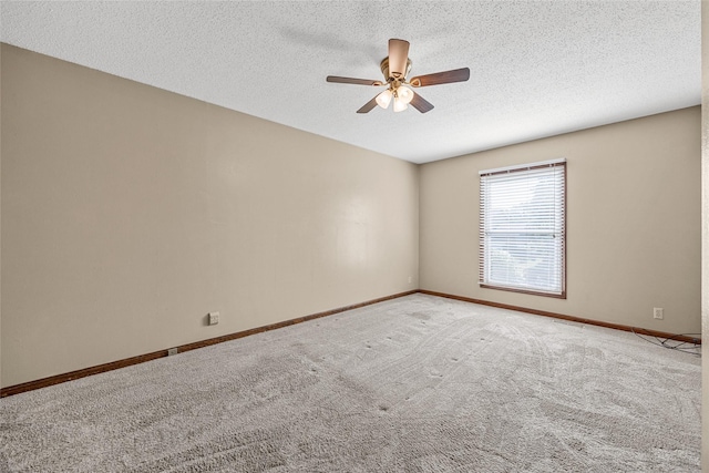 7005 Surrey Dr NE, Cedar Rapids, IA 52402 - empty room with ceiling fan, carpet floors, and a textured ceiling