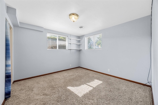 7005 Surrey Dr NE, Cedar Rapids, IA 52402 - carpeted empty room with baseboards