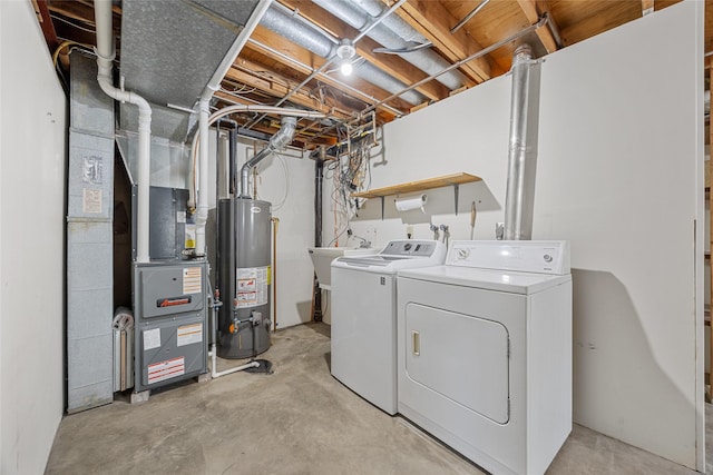 7005 Surrey Dr NE, Cedar Rapids, IA 52402 - washroom with washer and clothes dryer, water heater, and heating unit