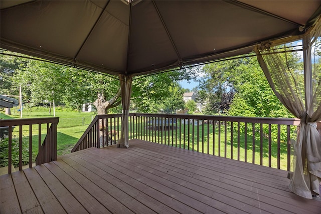 7005 Surrey Dr NE, Cedar Rapids, IA 52402 - wooden terrace featuring a yard
