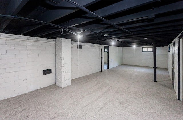 910 30th St, Des Moines, IA 50312 - basement with carpet