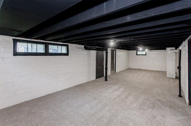 910 30th St, Des Moines, IA 50312 - basement with carpet