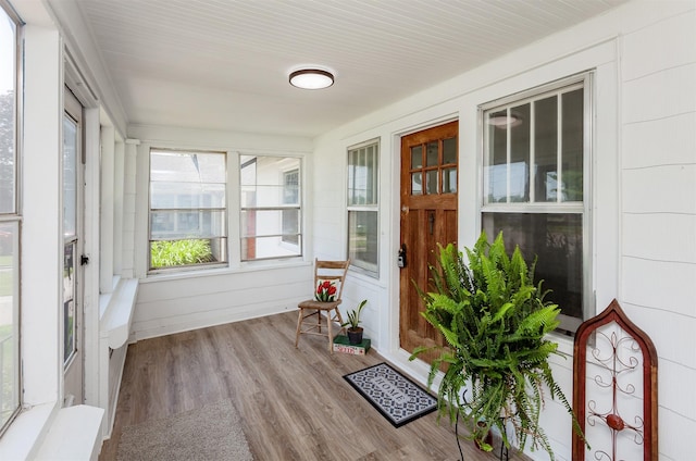 910 30th St, Des Moines, IA 50312 - sunroom featuring wood finished floors