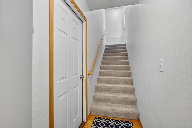 8302 Westown Pkwy Unit 7106, West Des Moines, IA 50266 - stairway featuring wood finished floors
