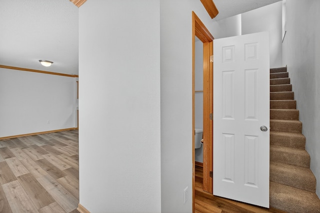 8302 Westown Pkwy Unit 7106, West Des Moines, IA 50266 - stairway with wood finished floors and baseboards