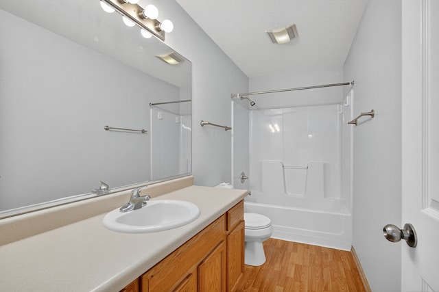 8302 Westown Pkwy Unit 7106, West Des Moines, IA 50266 - bathroom featuring vanity, wood finished floors, and shower / bath combination