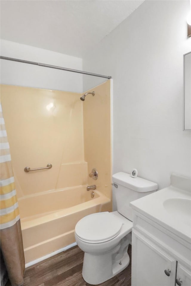 1356 E 17th Ct, Des Moines, IA 50316 - full bathroom featuring wood finished floors, shower / tub combo with curtain, and vanity