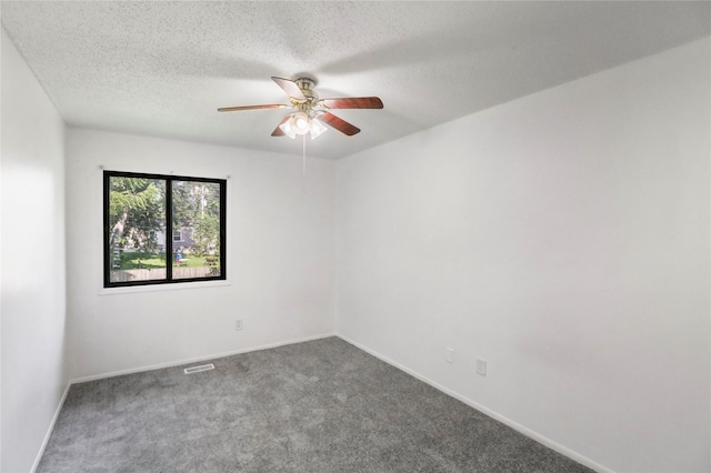 1356 E 17th Ct, Des Moines, IA 50316 - empty room featuring a ceiling fan, carpet floors, and a textured ceiling