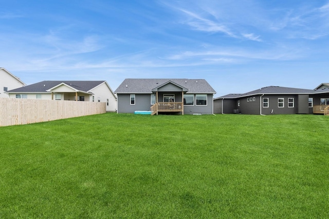 220 11th Ct NW, Bondurant, IA 50035 - back of house with a deck and a shingled roof