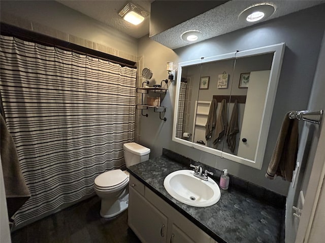 1016 1st St NW, Altoona, IA 50009 - bathroom featuring vanity, curtained shower, and a textured ceiling