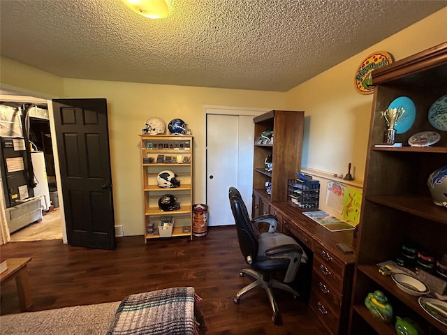 1016 1st St NW, Altoona, IA 50009 - home office with wood finished floors and a textured ceiling