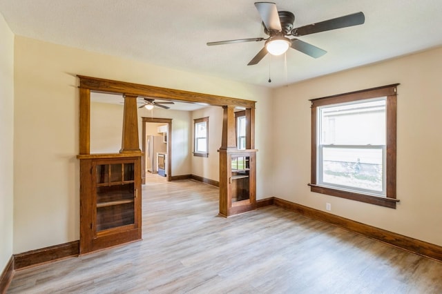 1141 Douglas Ave, Des Moines, IA 50313 - spare room with ceiling fan and light wood-style floors