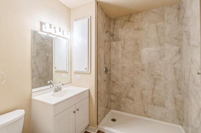 1141 Douglas Ave, Des Moines, IA 50313 - bathroom with vanity and tiled shower