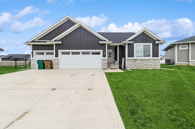 208 11th Ct NW, Bondurant, IA 50035 - craftsman inspired home with stone siding, board and batten siding, an attached garage, and driveway