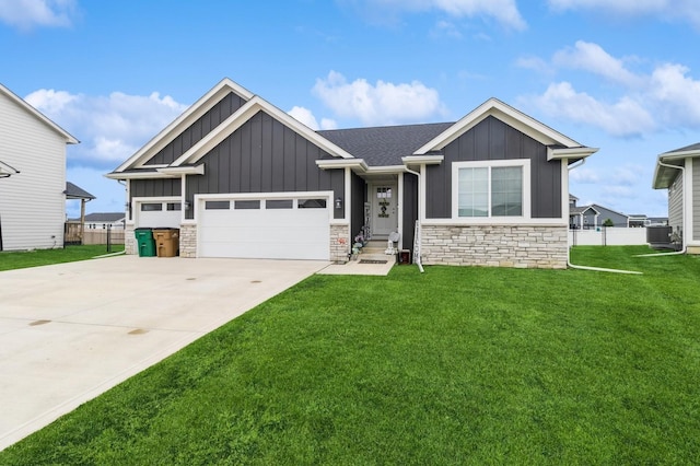 208 11th Ct NW, Bondurant, IA 50035 - craftsman house with board and batten siding, stone siding, concrete driveway, and an attached garage