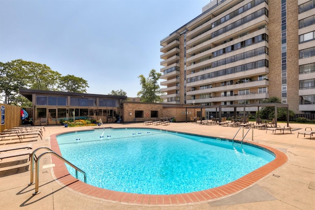 3663 Grand Ave Unit 501, Des Moines, IA 50312 - community pool featuring a patio