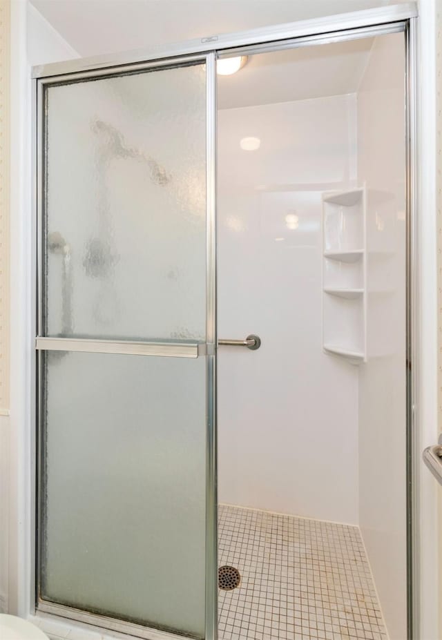 3663 Grand Ave Unit 501, Des Moines, IA 50312 - bathroom with a stall shower and tile patterned floors