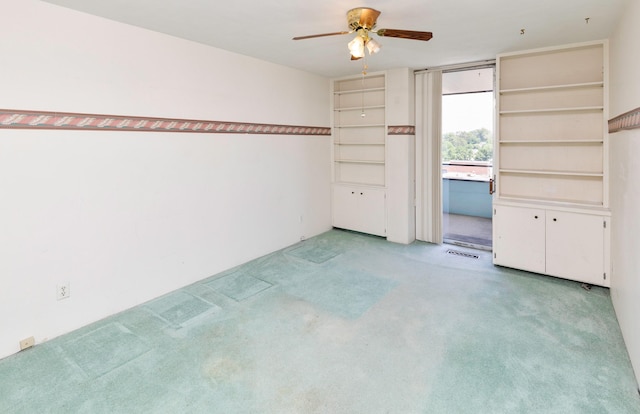 3663 Grand Ave Unit 501, Des Moines, IA 50312 - unfurnished room with light carpet and a ceiling fan
