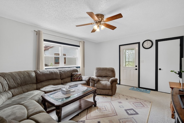3605 53rd St, Des Moines, IA 50310 - living room with a ceiling fan, light carpet, and a textured ceiling