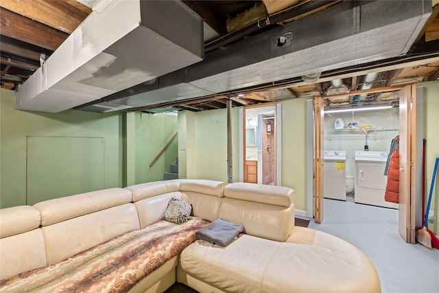 4104 1st St, Des Moines, IA 50313 - below grade area featuring washer and dryer and stairs