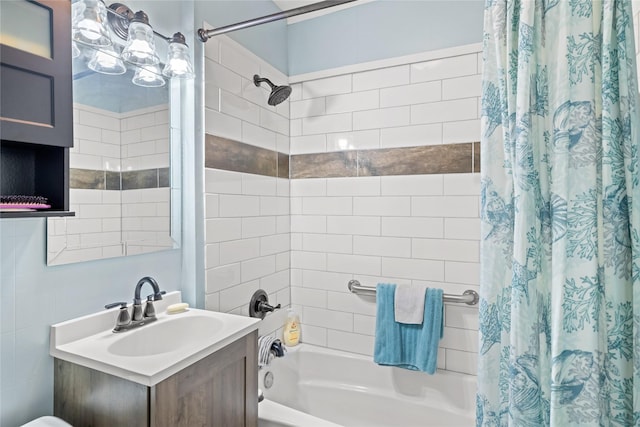 4104 1st St, Des Moines, IA 50313 - full bathroom featuring shower / bath combo and vanity