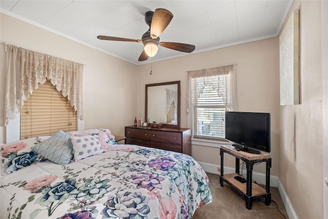 4104 1st St, Des Moines, IA 50313 - bedroom with carpet floors, ornamental molding, and ceiling fan