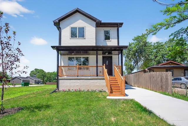 1218 Mccormick St, Des Moines, IA 50316 - view of front of house featuring a porch, a front lawn, and stairway