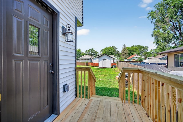 1218 Mccormick St, Des Moines, IA 50316 - deck featuring a storage shed