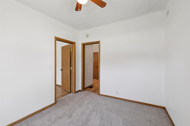 204 N Gaines St, Stuart, IA 50250 - spare room with light carpet and a ceiling fan